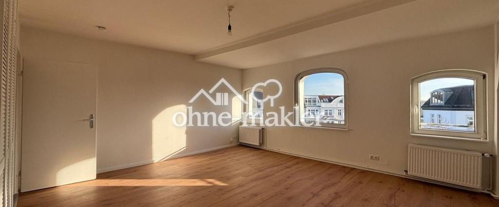 Großzügige Dachgeschosswohnung in begehrter Lage am Hohenzollerndamm - Photo 1