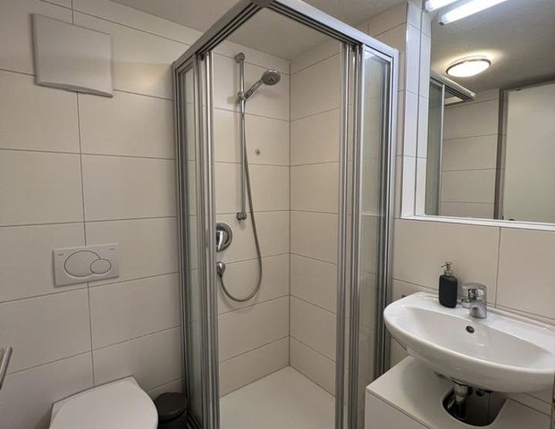 *Möbliert* Exklusive 1,5-Zimmer-Wohnung mit Terrasse und Fußbodenheizung - Foto 1
