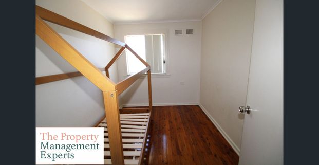 Tidy & Spacious 4-Bedroom Family Home in Miller - Photo 1