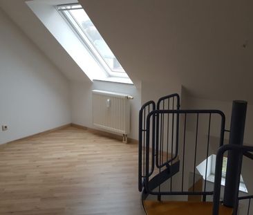 Ruhig gelegene Maisonette-Wohnung mit Balkon, Laminat und EBK im Da... - Photo 3