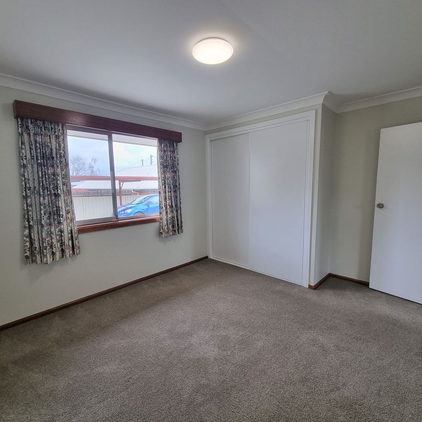 CLOSE TO TOWN - Photo 1