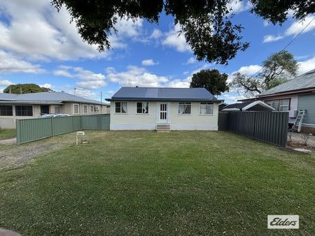 Long-Term 2-Bedroom Rental with Secure Fenced Yard - Photo 2