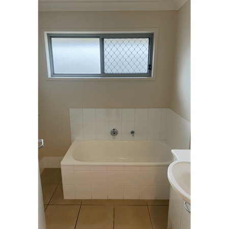 Modern, Low-Maintenance Living in a Quiet Gracemere Estate - Photo 3