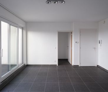 Instapklaar éénslaapkamerappartement met terras en autostaanplaats - Photo 2