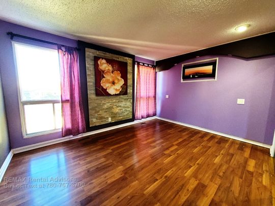 GREAT 4 BED, 2 BATH, 4 LEVEL SPLIT SINGLE FAMILY HOME W/ A DOUBLE ATTACHED GARAGE IN THE COMMUNITY OF BELMONT - Photo 1