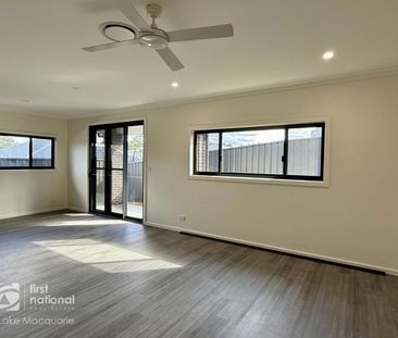 BRAND NEW MODERN FAMILY HOME - Photo 2