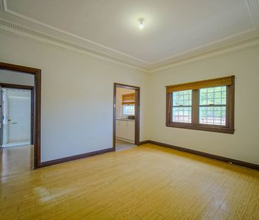 Spacious 3-Bedroom Home with Yard & Parking - Photo 1