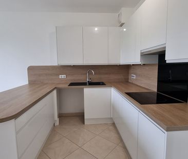 Location Appartement 3 pièces 58m² - Photo 4