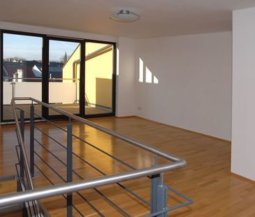 Wunderschöne Maisonette-Wohnung mit sonniger Dachterrasse direkt in... - Foto 1