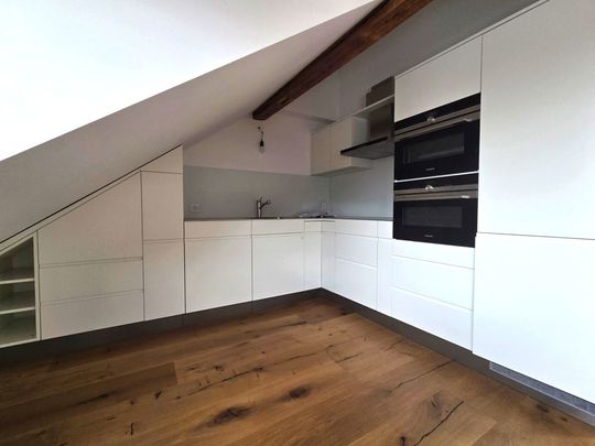 Grosszügige und moderne Dachwohnung im Gundeli - Photo 1