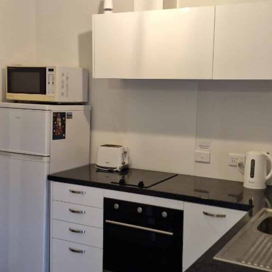 Fully Furnished Lock up and Leave - Photo 1