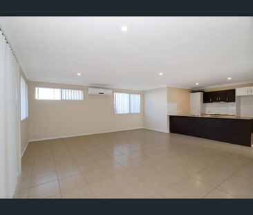 Beautifully presented 4 Bedroom home with an Extra Large Living Area - Photo 1