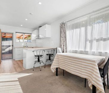 Sunny single level unit with covered deck - Photo 6