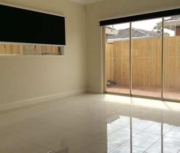 Register to Inspect // Stylish Two-Bedroom Townhouse with Dual Livi... - Photo 6