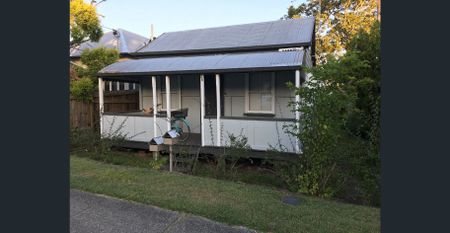 Two Bedroom Home in Central Location + Lawn Maintenance Included! - Photo 3