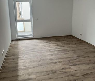 Wohlfühlwohnung mit Balkon und moderner Ausstattung im Erstbezug! R... - Foto 1