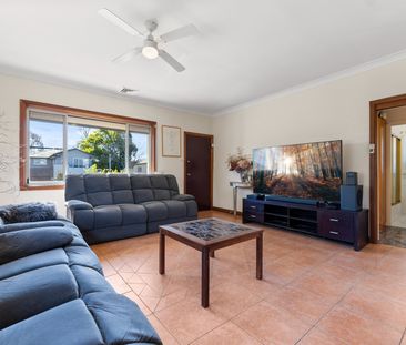 Air-Conditioned Three-Bedroom Home with Updated Kitchen and Tiled L... - Photo 5