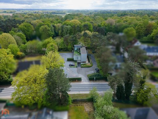 Kantoorruimtes met ruime parking op een perceel van 2534 m² te Tremelo - Foto 1