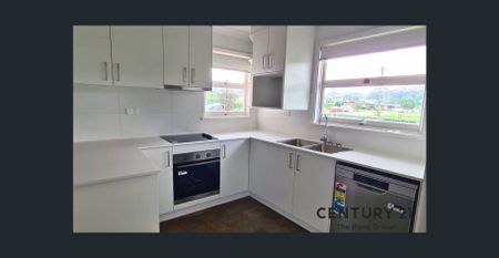 Spacious 4-Bedroom Family Home in a Great Location! - Photo 4