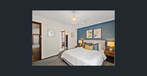 Spacious Coastal Home with Vaulted Ceilings and Drive-Through Garage - Photo 1