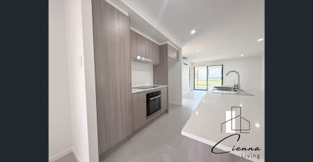 Spacious 4-Bedroom, 2-Bathroom House - Photo 3