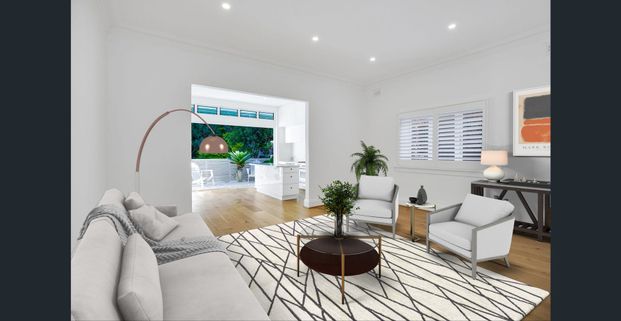 STUNNING AND SPACIOUS TOP FLOOR 2 BEDROOM RENOVATED APARTMENT - Photo 1