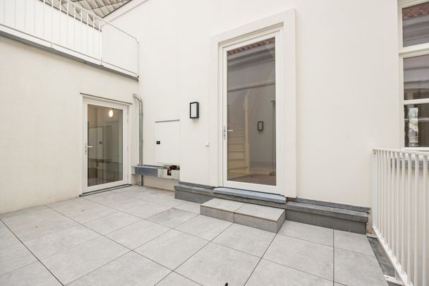 High-end duplex in hart van Antwerpen met iconisch uitzicht - Photo 1