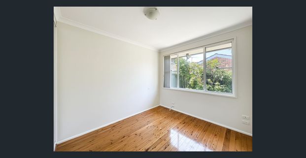 Charming Brick Home with Elegant Interiors and Low Maintenance Courtyard - Photo 1