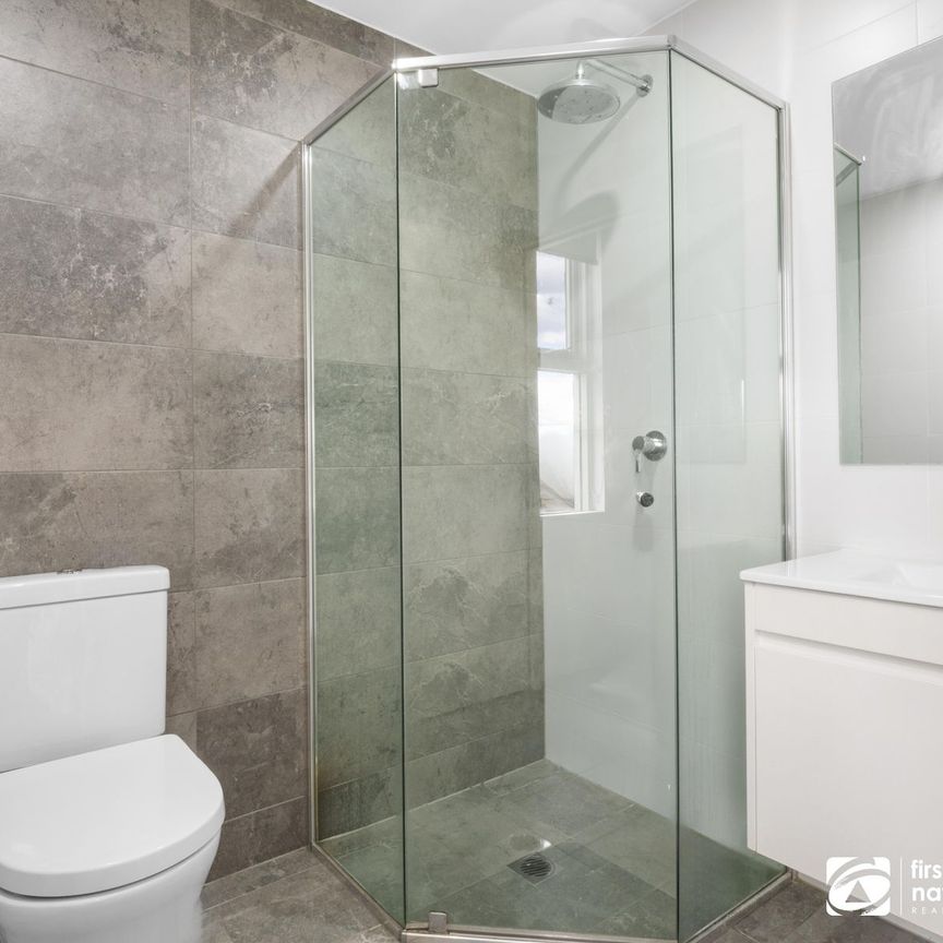 Convenient and contemporary living! - Photo 1