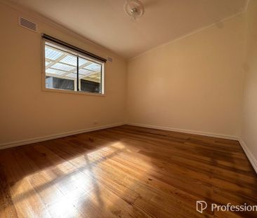 Premium Location | Renovated Five-Bedroom Home with Two Kitchens & Multiple Living Zones - Photo 2