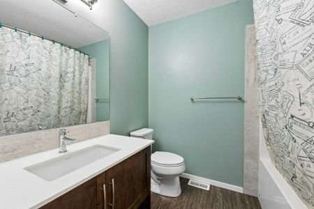 Quiet & Contemporary 3 Bed Townhouse | Close To Cross Iron Mall. Garage & A/C Included - Photo 4