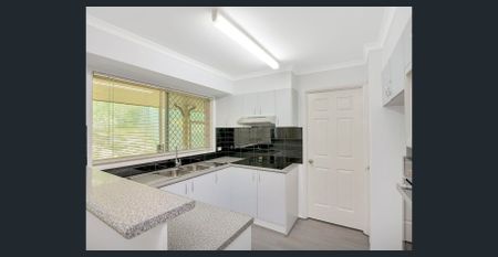 Low-Maintenance Living in a Secure Complex - Photo 5