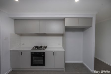 BRAND NEW 4 BEDROOM HOME!! - Photo 2