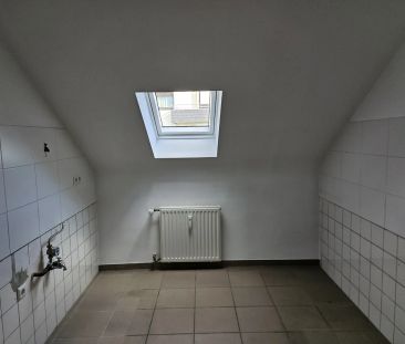 Moderne Dachgeschosswohnung in ruhiger Lage - Photo 1