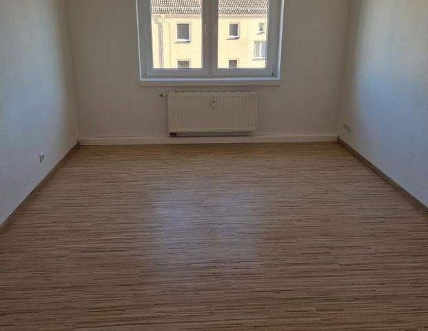 Ideale Familien-Wohlfühlwohnung mit Balkon in ruhiger und grüner Umgebung! - Foto 1