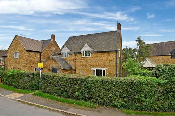 Modern family home in sought after village - Photo 1