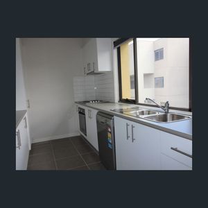 Modern & Spacious 2 Bedroom Townhouse Available! - Photo 2