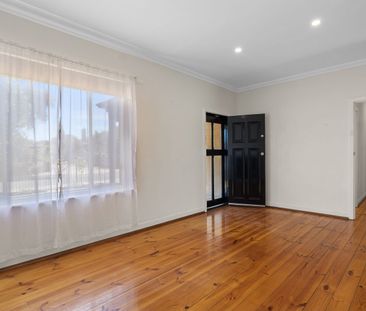 Character Charm & Modern Comfort in Prime South Plympton Location - Photo 2