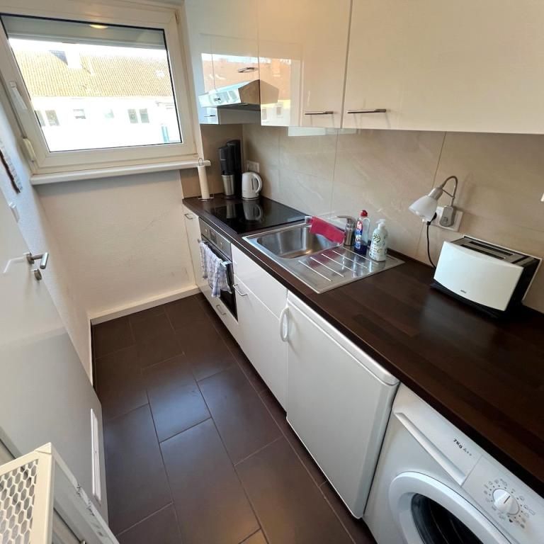 Gemütliche Zwei-Zimmer-Wohnung mit Balkon - Foto 1