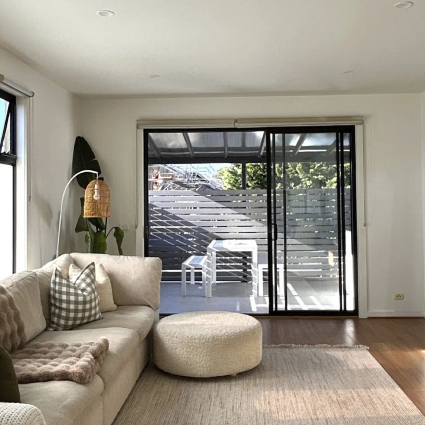 STYLISH TOWNHOUSE WITH INDOOR & OUTDOOR FLAIR! - Photo 1