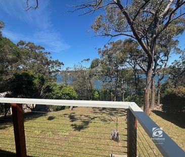 FRESHLY RENOVATED ON THE LAKES EDGE! - Photo 5