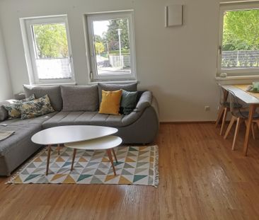 Architektonisch moderne Zweizimmerwohnung mit Caport und PKW-Stellp... - Foto 5