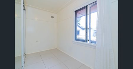 Freshly Painted 3-Bedroom Home on a Large Block - Photo 3