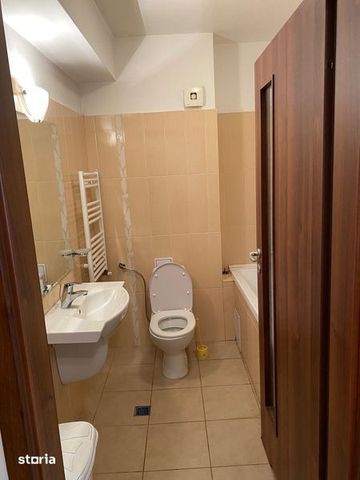 Dau inchirie apartament,cu o camera,strada Teodor Mihali - Photo 5