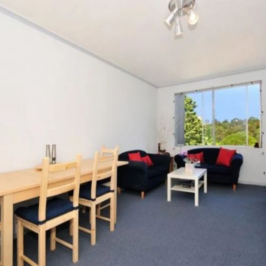 Two-Bedroom Apartment with Pool in Well-Maintained Complex - Photo 1