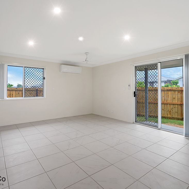 3BED HOME WITH LARGE OPEN PLAN LIVING WITH AIR-CON - Photo 1