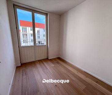 Lichtrijke nieuwbouwwoning met 3 slaapkamers, tuin en ondergrondse staanplaats - foto 1