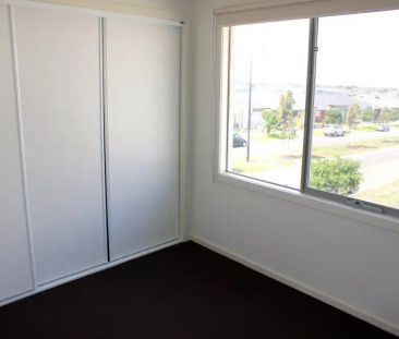 “Bright, Fresh, Stunning Townhouse with Open Plan living!” - Photo 4