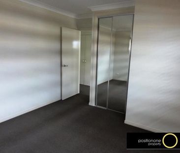 Stylish Three-Bedroom Townhouse in Prime Carina Heights Location - Photo 1