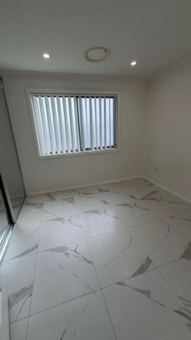 Modern 4-Bedroom Home Offering Style & Convenience - Photo 5